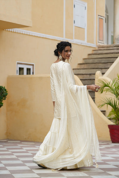 Ivory Chanderi Silk Jacquard Sharara Suit at PinkPhulkari Ivory Chanderi Silk Jacquard Sharara Suit at PinkPhulkari 
