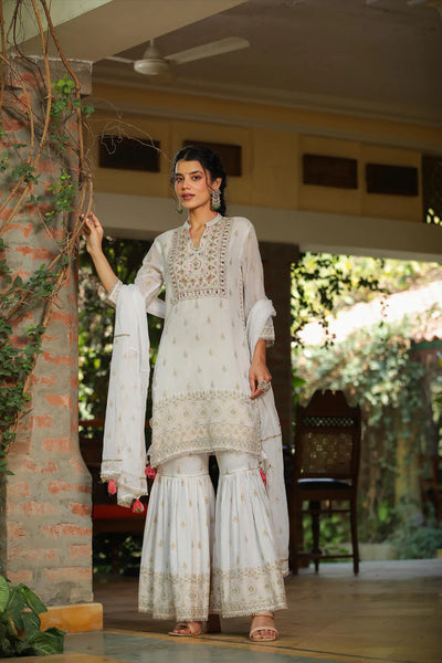Buy White Mulmul Cotton Sharara Suit at PinkPhulkari CaliforniaBuy White Mulmul Cotton Sharara Suit at PinkPhulkari California