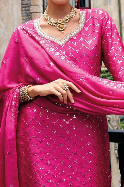 Buy Hot Pink Heavy Embroidered Sharara Suit at PinkPhulkari CaliforniaBuy Hot Pink Heavy Embroidered Sharara Suit at PinkPhulkari California
