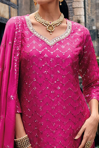 Buy Hot Pink Heavy Embroidered Sharara Suit at PinkPhulkari CaliforniaBuy Hot Pink Heavy Embroidered Sharara Suit at PinkPhulkari California