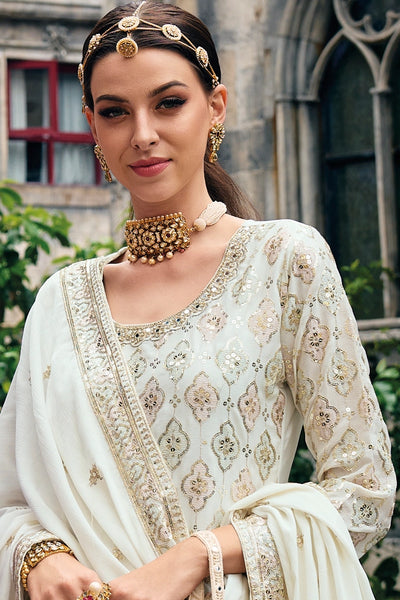 Buy Ivory Heavy Embroidered Sharara Suit at PinkPhulkari CaliforniaBuy Ivory Heavy Embroidered Sharara Suit at PinkPhulkari California